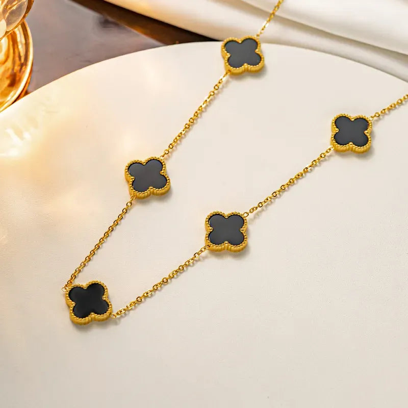 Black and white Double Sided Clover Necklace .