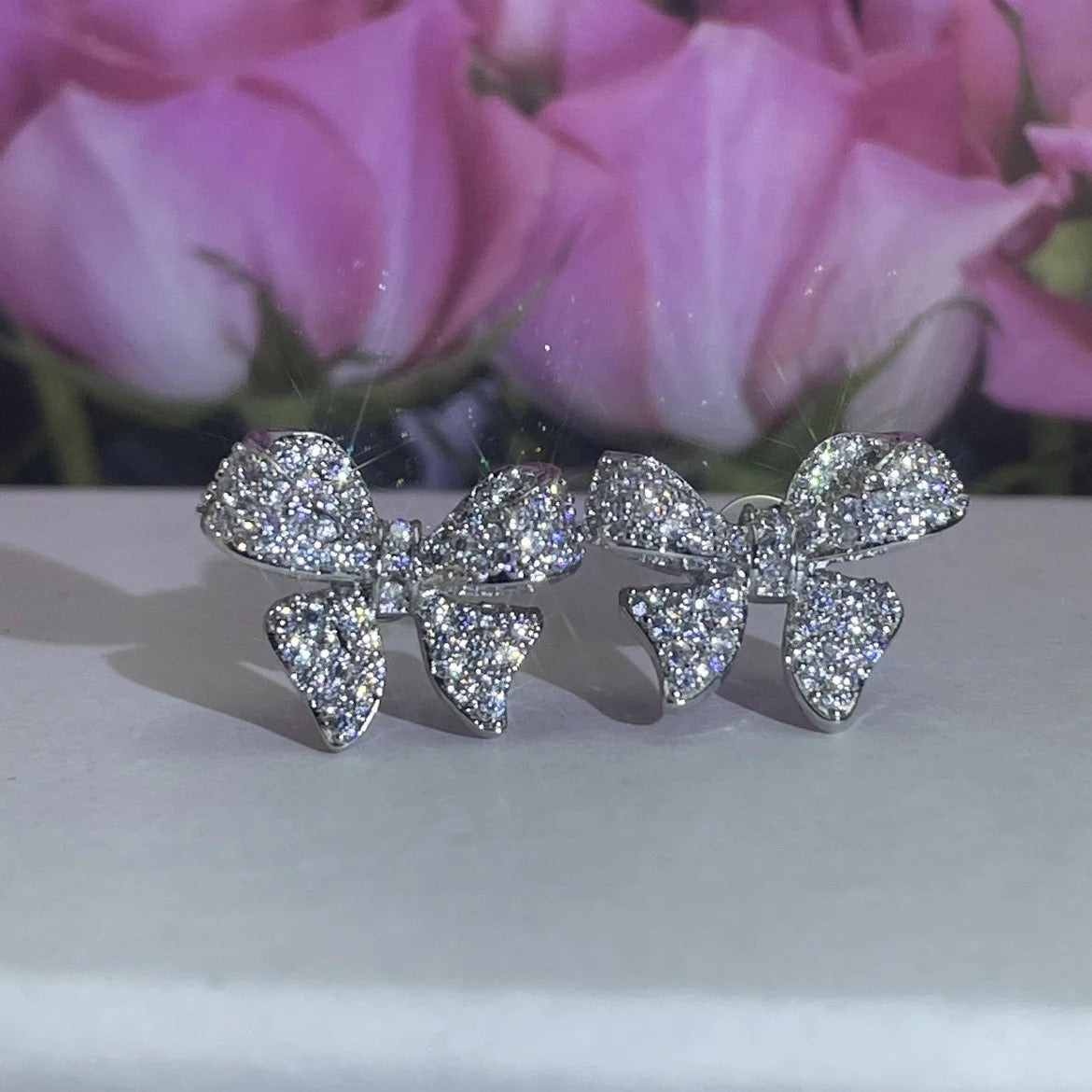 Tiny Rhodium Bow Studs