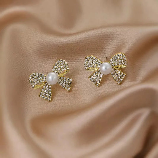 Shiny Bow Gold Studs